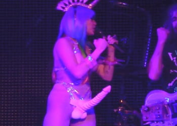 Miley Cyrus nude costume strapon show
