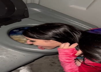 Dirty whore licking public porta potty