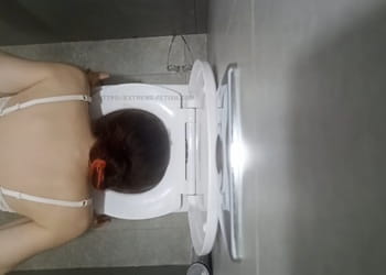 Dirty sub slut licking inside toilet bowl